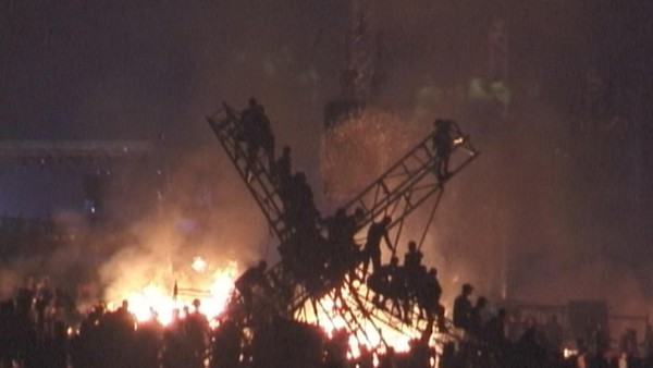 Image of fire and riots at Woodstock '99